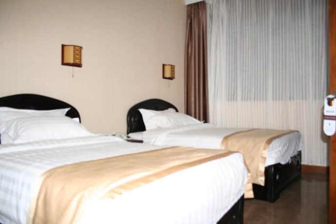 Imagen de la habitación del Hotel Hong Shan Yi. Foto 16