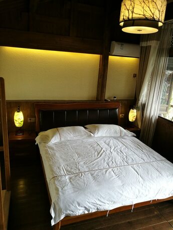 Imagen de la habitación del Hotel Hongcun Dunyuan Hall. Foto 2