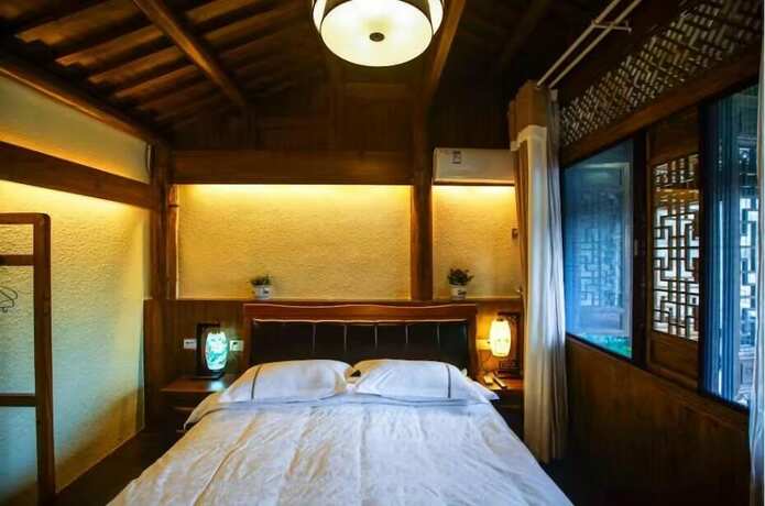 Imagen de la habitación del Hotel Hongcun Dunyuan Hall. Foto 4