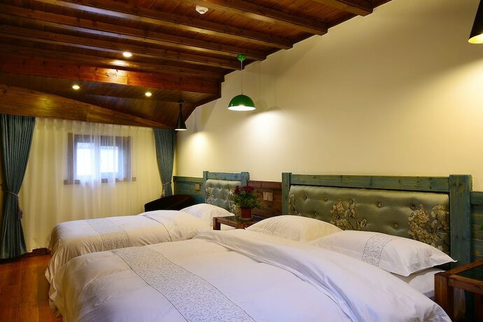 Imagen de la habitación del Hotel Hongcun Dunyuan Hall. Foto 6