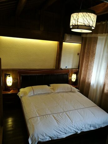 Imagen de la habitación del Hotel Hongcun Dunyuan Hall. Foto 7