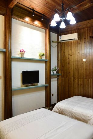 Imagen de la habitación del Hotel Hongcun Dunyuan Hall. Foto 9