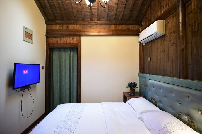 Imagen de la habitación del Hotel Hongcun Dunyuan Hall. Foto 14
