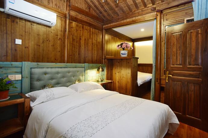 Imagen de la habitación del Hotel Hongcun Dunyuan Hall. Foto 15