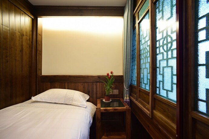 Imagen de la habitación del Hotel Hongcun Dunyuan Hall. Foto 16