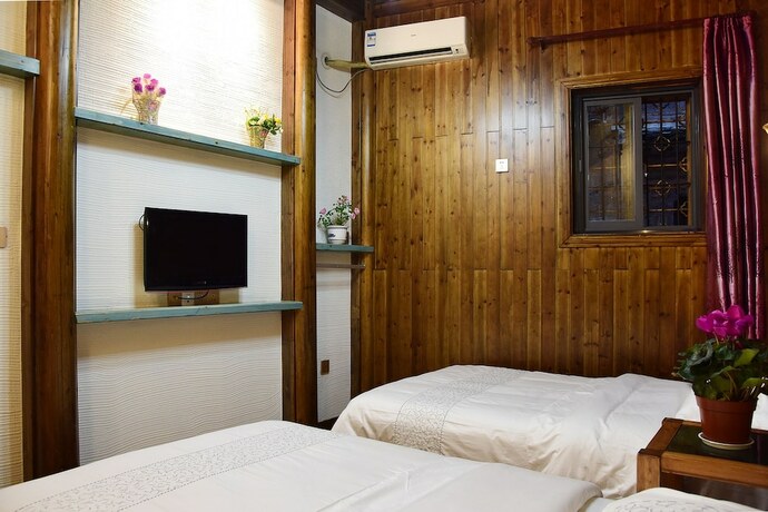 Imagen de la habitación del Hotel Hongcun Dunyuan Hall. Foto 18