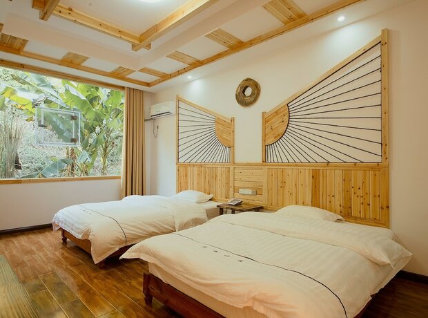 Imagen de la habitación del Hotel Hongfu Guesthouse. Foto 14