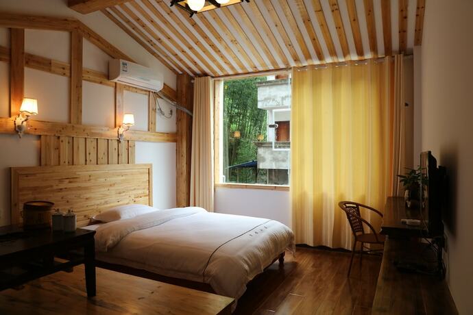 Imagen de la habitación del Hotel Hongfu Guesthouse. Foto 16