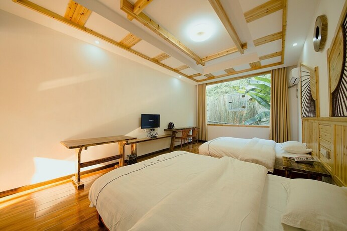 Imagen de la habitación del Hotel Hongfu Guesthouse. Foto 18
