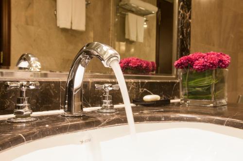 Imagen de la habitación del Hotel Hongguang Hotel Wuhan. Foto 5