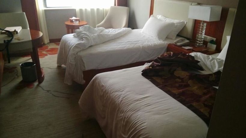 Imagen de la habitación del Hotel Hongkong International Hot Spring. Foto 8