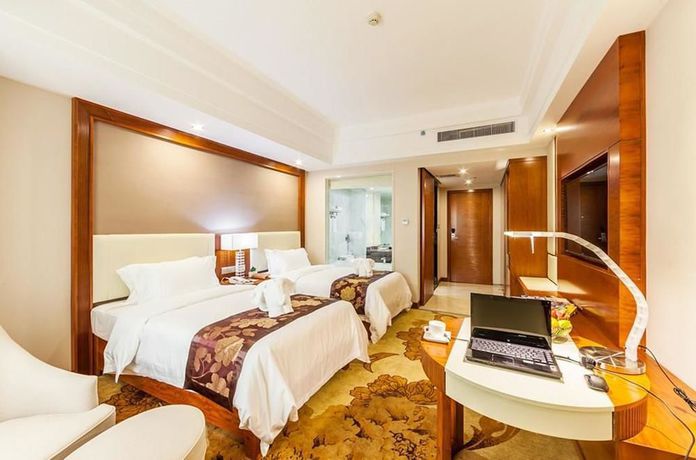 Imagen de la habitación del Hotel Hongkong International Hot Spring. Foto 11
