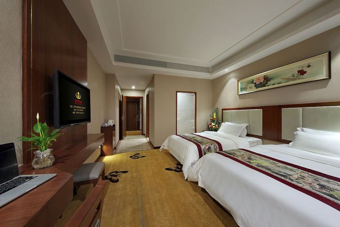 Imagen de la habitación del Hotel Honglilai Shenzhen. Foto 15