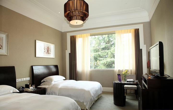 Imagen de la habitación del Hotel Hongqiao State Guest Shanghai. Foto 4