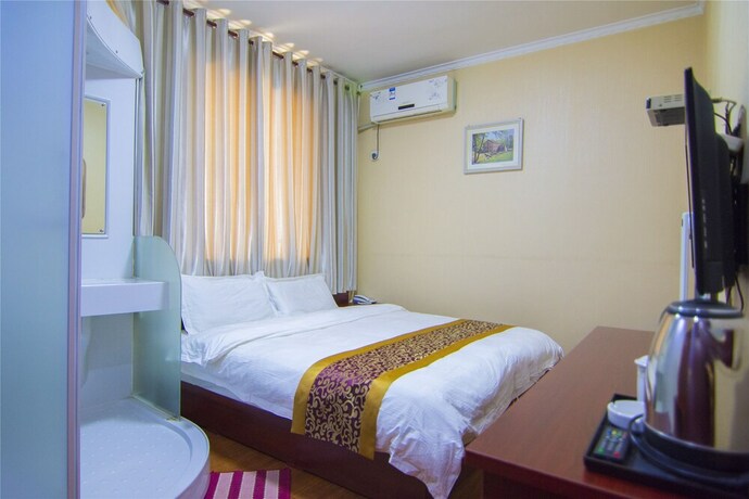 Imagen de la habitación del Hotel Hongrui Business Hotel Xi'an Airport. Foto 39