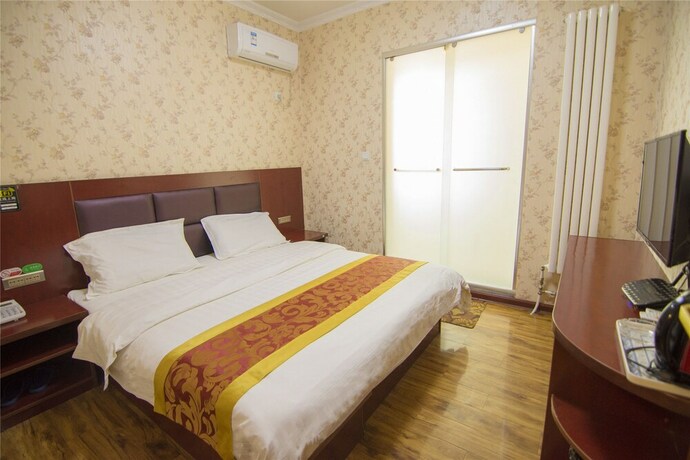 Imagen de la habitación del Hotel Hongrui Business Hotel Xi'an Airport. Foto 43