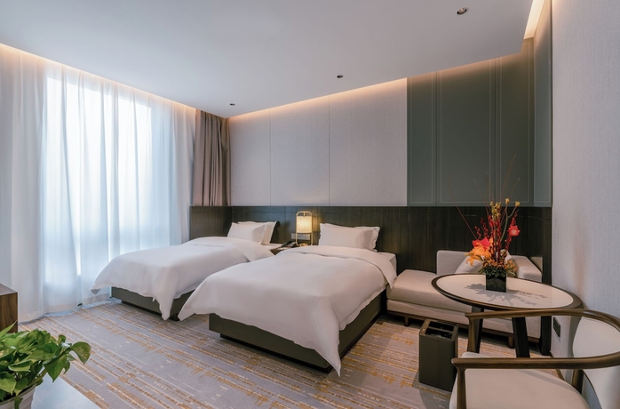 Imagen de la habitación del Hotel Hongshan. Foto 14