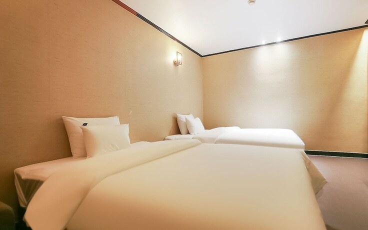 Imagen de la habitación del Hotel Hongsung H. Foto 15