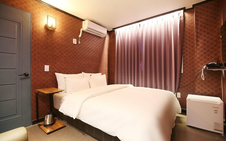Imagen de la habitación del Hotel Hongsung H. Foto 16