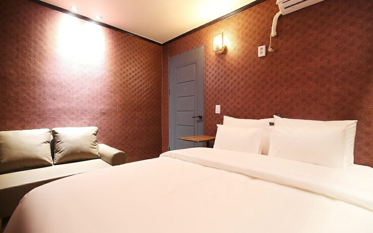 Imagen de la habitación del Hotel Hongsung H. Foto 18