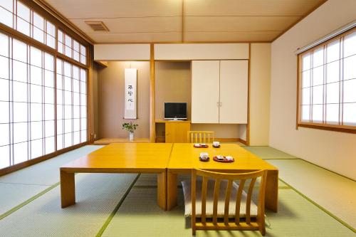 Imagen de la habitación del Hotel Honjin Hiranoya Kofukan. Foto 3
