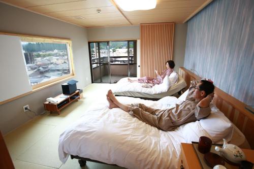 Imagen de la habitación del Hotel Honjin Hiranoya Kofukan. Foto 5