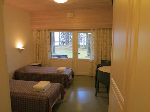 Imagen de la habitación del Hotel Honkiniemi. Foto 7