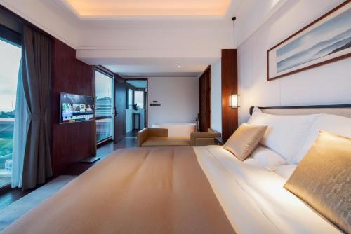 Imagen de la habitación del Hotel Honor Hotels and Resorts Yun Shu Dali. Foto 8