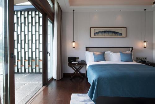 Imagen de la habitación del Hotel Honor Hotels and Resorts Yun Shu Dali. Foto 9