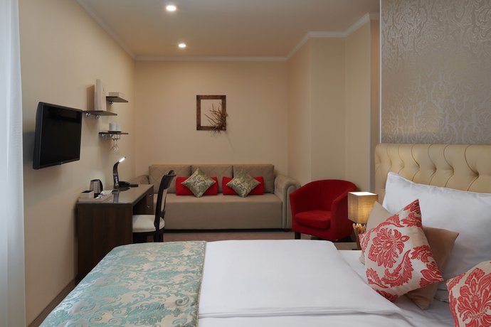 Imagen de la habitación del Hotel Honour and Grace Hotel. Foto 13