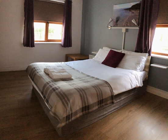 Imagen de la habitación del Hotel Hookless Holiday Homes. Foto 8