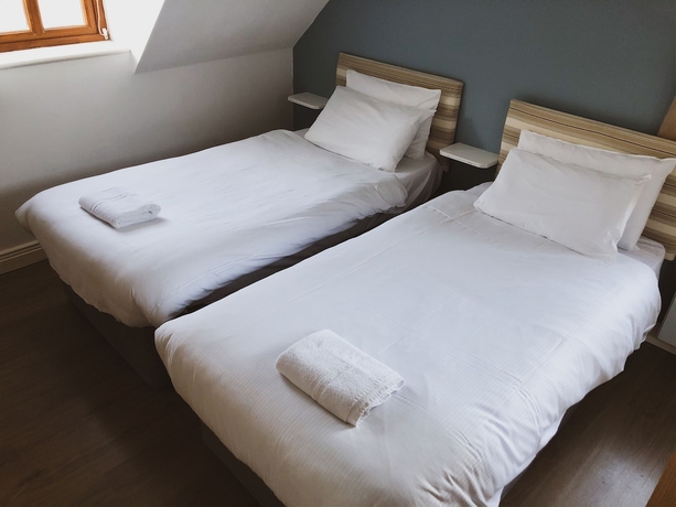 Imagen de la habitación del Hotel Hookless Holiday Homes. Foto 11