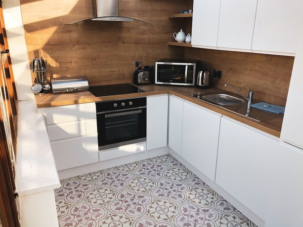 Imagen de la habitación del Hotel Hookless Holiday Homes. Foto 12