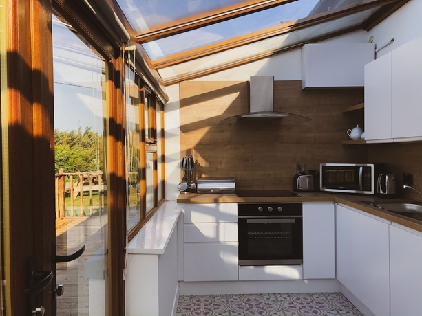 Imagen de la habitación del Hotel Hookless Holiday Homes. Foto 14