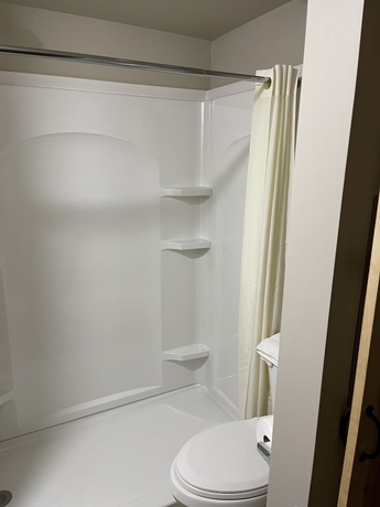 Imagen de la habitación del Hotel Hooks Hideaway Motel. Foto 13