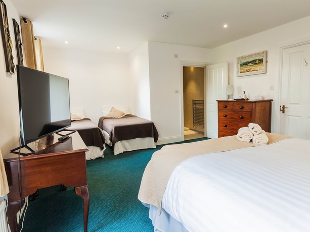 Imagen de la habitación del Hotel Hookwood Lodge. Foto 4