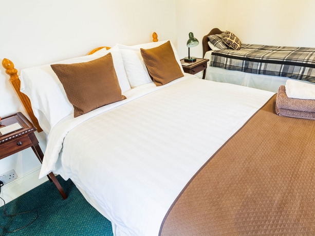 Imagen de la habitación del Hotel Hookwood Lodge. Foto 6