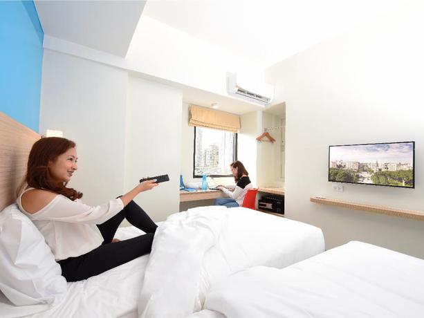 Imagen de la habitación del Hotel Hop Inn Hotel Aseana City. Foto 10