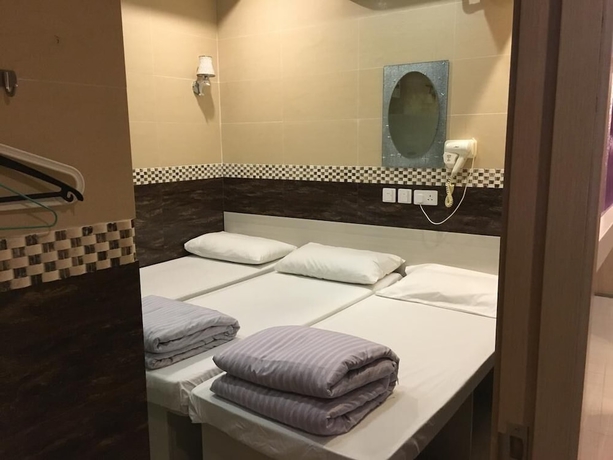 Imagen de la habitación del Hotel Hop Inn On Nathan Road. Foto 3