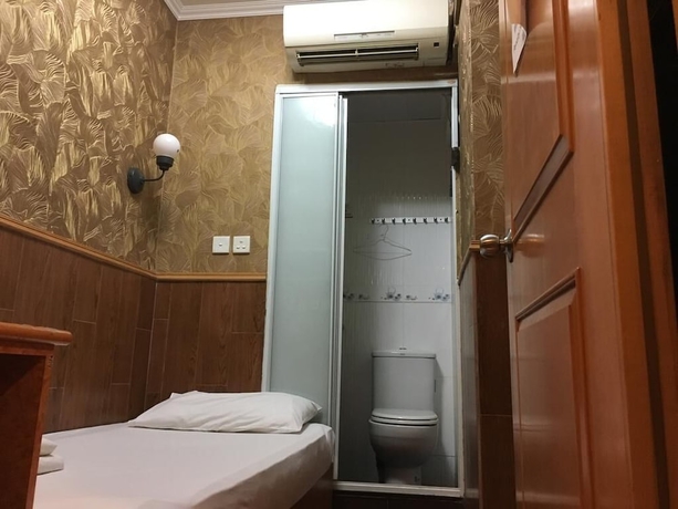 Imagen de la habitación del Hotel Hop Inn On Nathan Road. Foto 7