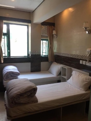 Imagen de la habitación del Hotel Hop Inn On Nathan Road. Foto 8