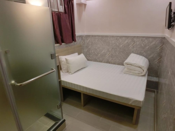 Imagen de la habitación del Hotel Hop Inn On Nathan Road. Foto 10