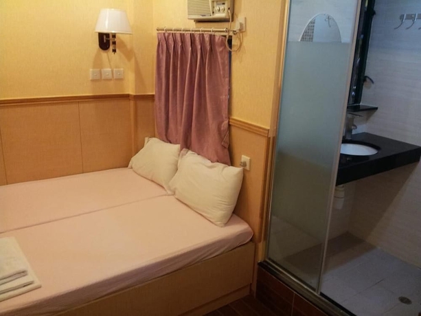 Imagen de la habitación del Hotel Hop Inn On Nathan Road. Foto 11