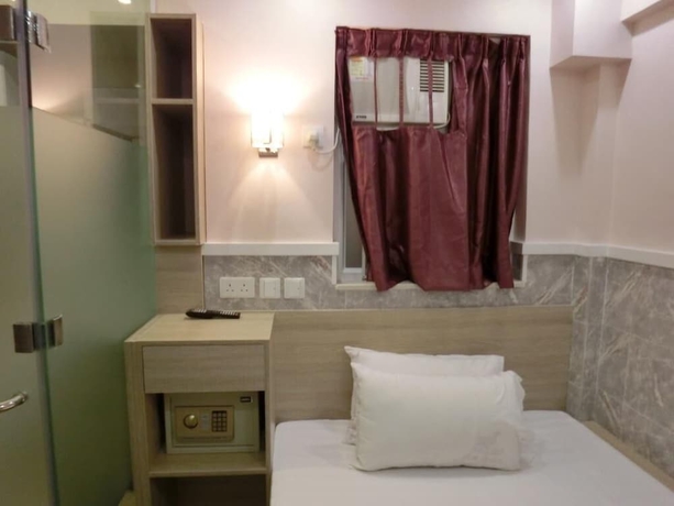 Imagen de la habitación del Hotel Hop Inn On Nathan Road. Foto 13