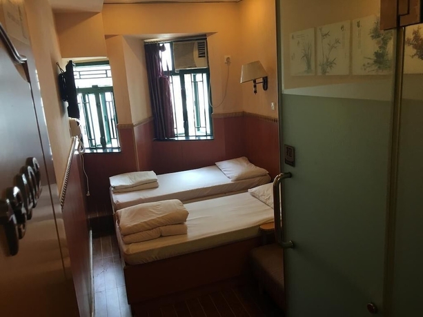 Imagen de la habitación del Hotel Hop Inn On Nathan Road. Foto 14