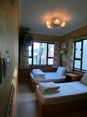 Imagen de la habitación del Hotel Hop Inn On Nathan Road. Foto 15
