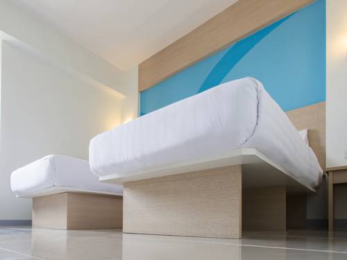 Imagen de la habitación del Hotel Hop Inn Roi Et. Foto 7