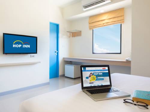 Imagen de la habitación del Hotel Hop Inn Roi Et. Foto 12