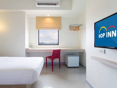 Imagen de la habitación del Hotel Hop Inn Surat Thani. Foto 16