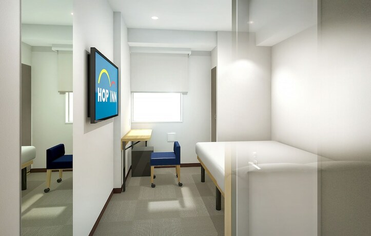 Imagen de la habitación del Hotel Hop Inn Tokyo Iidabashi. Foto 19